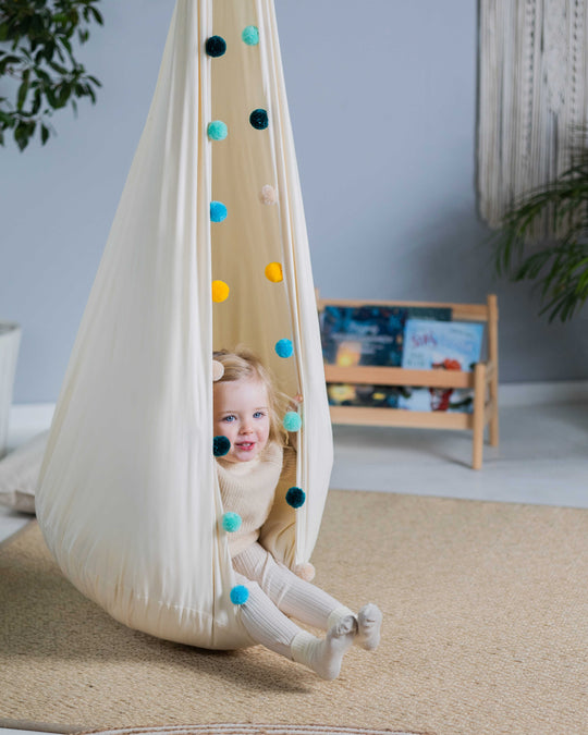 Hängekokon Schaukel Regenbogen Pompon | Reine Natur Kollektion